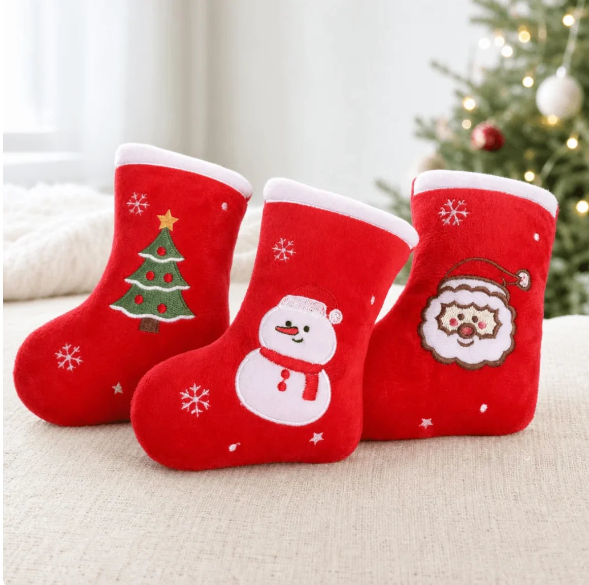 Squeaky dog toy in a festive Christmas stocking design, perfect for interactive play and holiday fun for pets. 7