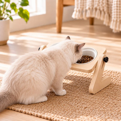 Adjustable elevated pet feeder with double ceramic bowls in a natural wood design, perfect for cats and small dogs to promote comfortable eating posture. 0