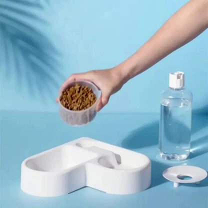 Automatic pet feeding station featuring a compact 2-in-1 bowl design with an integrated water dispenser, ideal for cats and dogs. 5