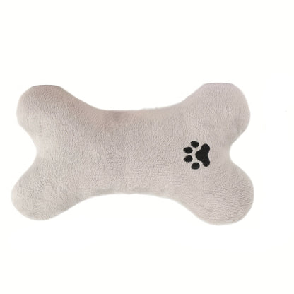 Bone-shaped plush pet pillow designed for small to medium dogs and cats, featuring a soft, washable fabric for ultimate comfort and easy cleaning. 0