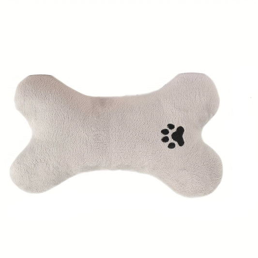 Bone-shaped plush pet pillow designed for small to medium dogs and cats, featuring a soft, washable fabric for ultimate comfort and easy cleaning. 0