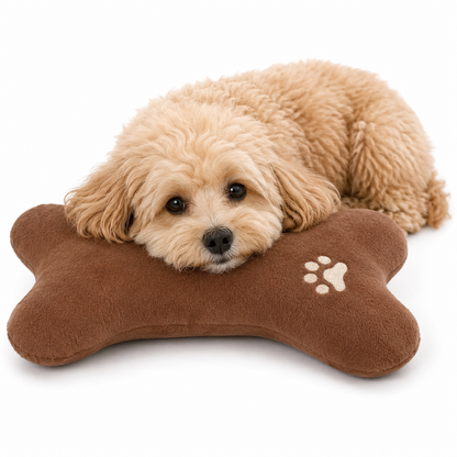 Bone-shaped plush pet pillow designed for small to medium dogs and cats, featuring a soft, washable fabric for ultimate comfort and easy cleaning. 1