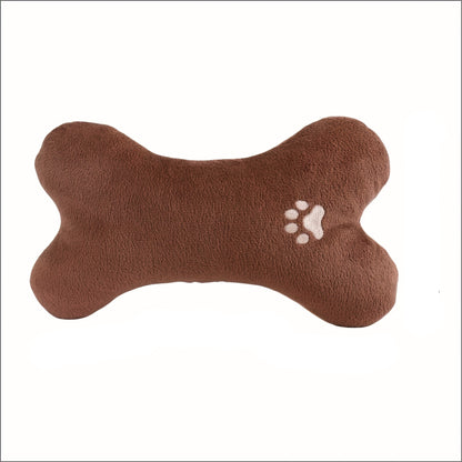 Bone-shaped plush pet pillow designed for small to medium dogs and cats, featuring a soft, washable fabric for ultimate comfort and easy cleaning. 8