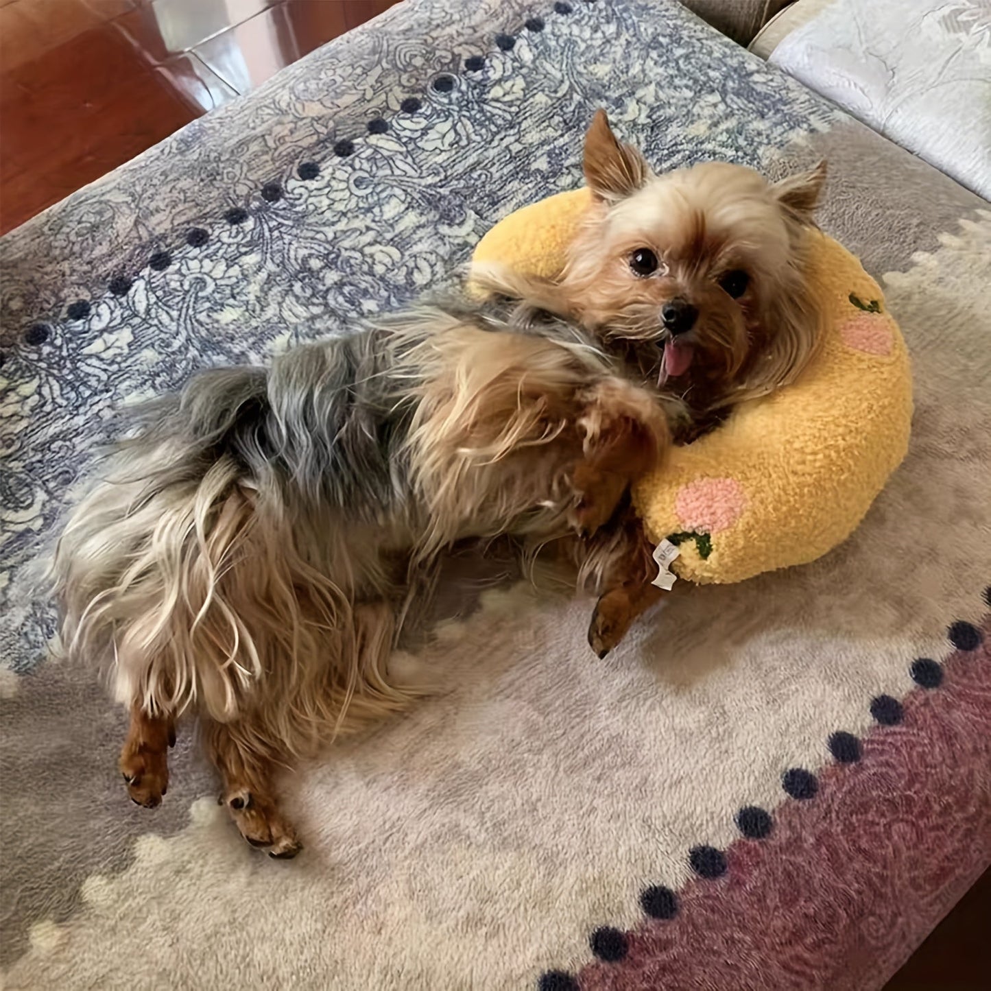 Calming plush dog neck pillow designed for small dogs, providing ergonomic sleep support and comfort. 6