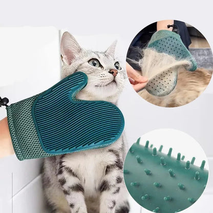 Cat grooming glove featuring an ergonomic design and soft silicone tips, perfect for easy fur removal on all fur types. 1