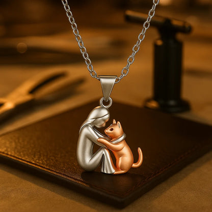 Cat Hug Pendant Necklace featuring an elegant design, 14K gold-plated finish, and an adjustable chain, perfect for cat lovers and as a keeps 1