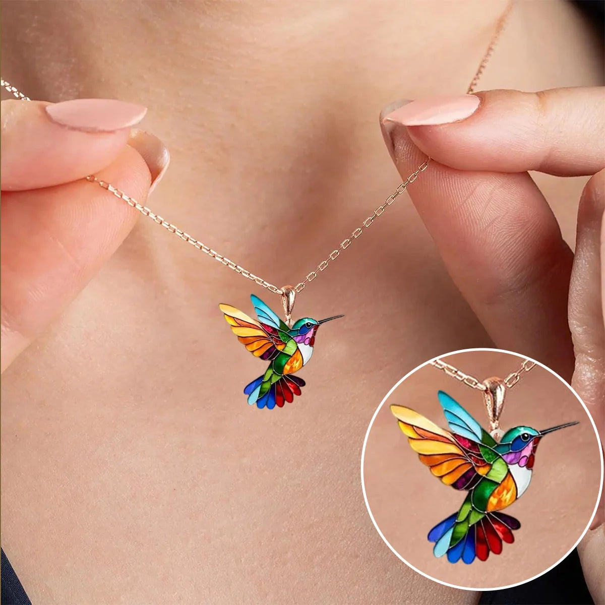 Colorful hummingbird necklace pendant featuring multicolor stained detail, crafted from gold-plated stainless steel, perfect for adding a vibrant touch to any outfit. 0