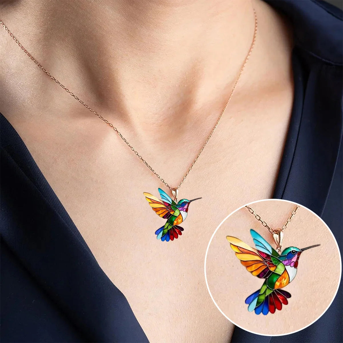 Colorful hummingbird necklace pendant featuring multicolor stained detail, crafted from gold-plated stainless steel, perfect for adding a vibrant touch to any outfit. 1