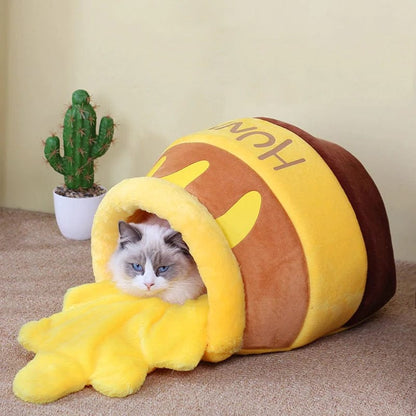 Cozy plush pet bed for cats and small dogs featuring a honey-pot design, ultra-soft fabric, and a comfortable indoor sleeping sanctuary. 3