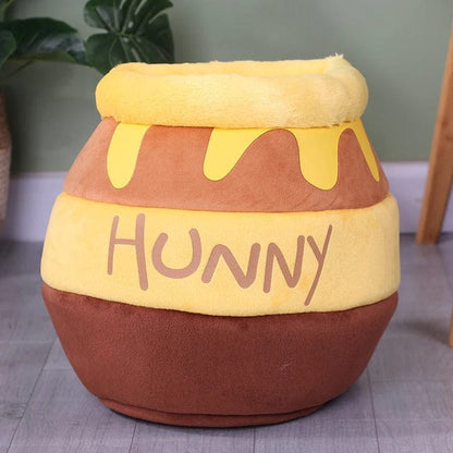 Cozy plush pet bed for cats and small dogs featuring a honey-pot design, ultra-soft fabric, and a comfortable indoor sleeping sanctuary. 6