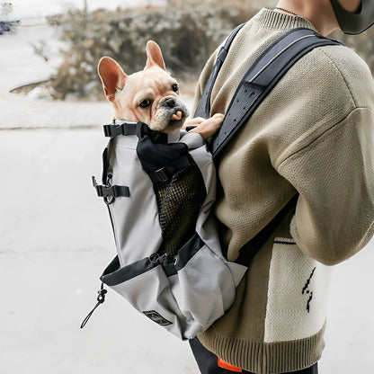 Dog carrier backpack designed for small dogs featuring breathable mesh panels, adjustable support straps, and reflective strips for safety and comfort. 0