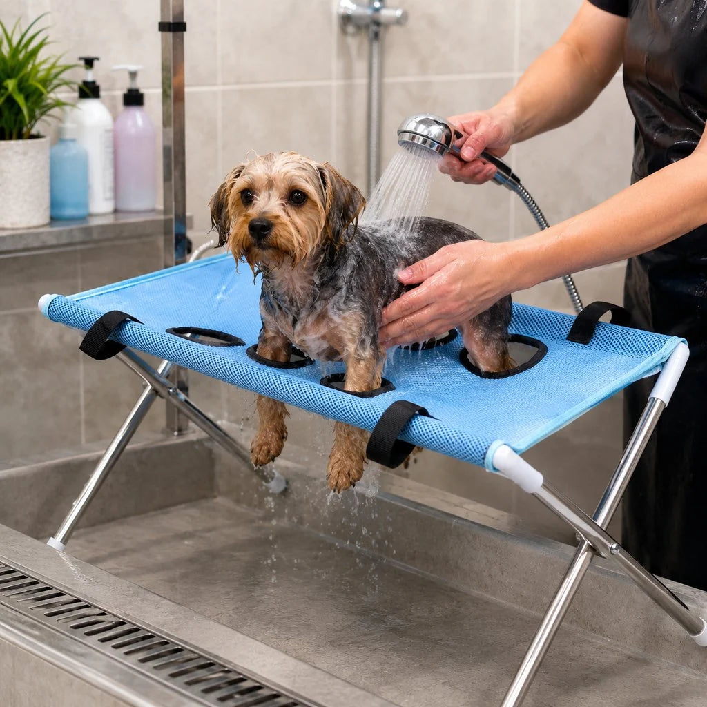Dog grooming stand featuring adjustable openings and breathable mesh, designed as a foldable table for small dogs and cats, providing convenience and comfort during grooming sessions. 1