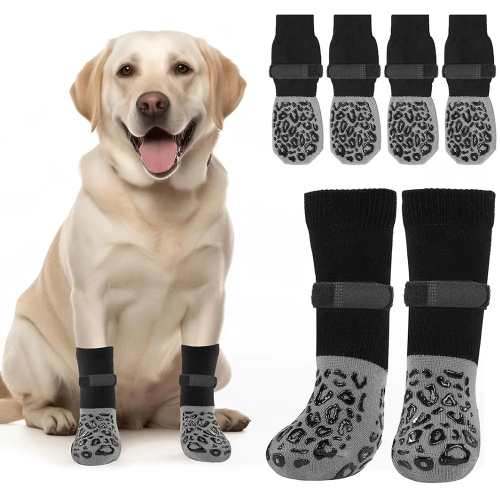 Dog socks with grips for traction on slippery floors, featuring anti-slip black design, available in a 4-pack with sizes ranging from S to XL. 0