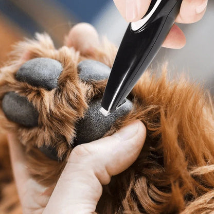 Electric dog grooming clippers featuring a quiet operation and durable design, ideal for easy home grooming of pets. 3