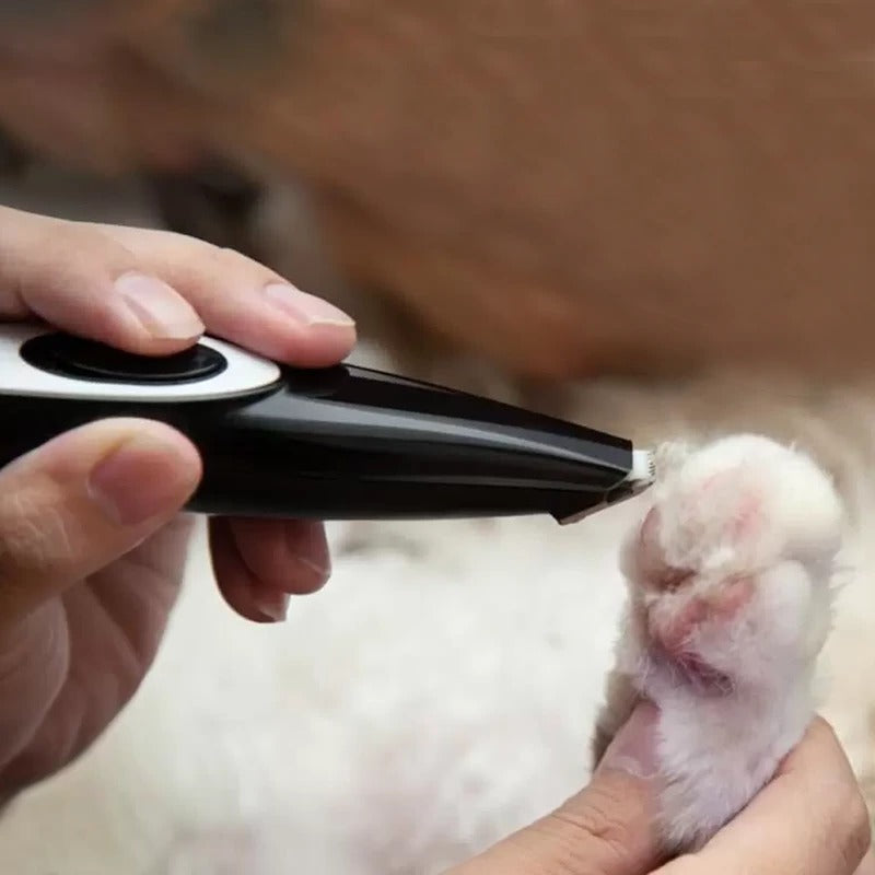 Electric dog grooming clippers featuring a quiet operation and durable design, ideal for easy home grooming of pets. 4