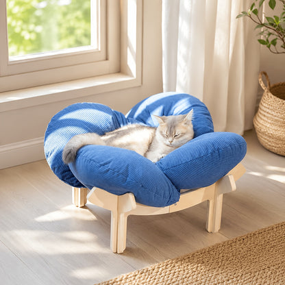 Elevated pet bed with a washable cushion, featuring a modern wooden design, ideal for cats and small dogs. 0