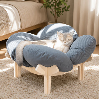 Elevated pet bed with a washable cushion, featuring a modern wooden design, ideal for cats and small dogs. 10