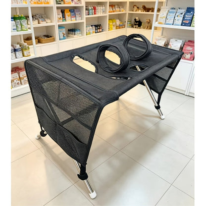 Foldable dog grooming table with hammock, featuring a stable surface for small dogs and cats, designed for easy storage and portability. 0
