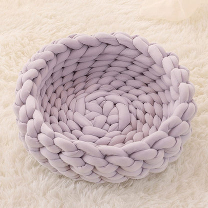Handwoven cat bed in natural beige with a plush cushion and breathable design, perfect for small pets to relax and feel cozy. 0