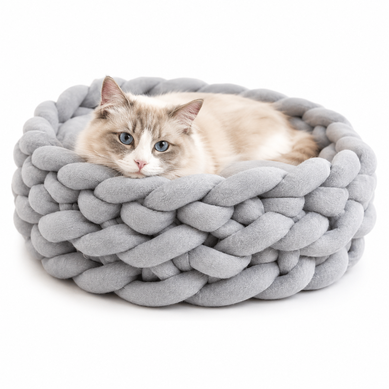 Handwoven cat bed in natural beige with a plush cushion and breathable design, perfect for small pets to relax and feel cozy. 1