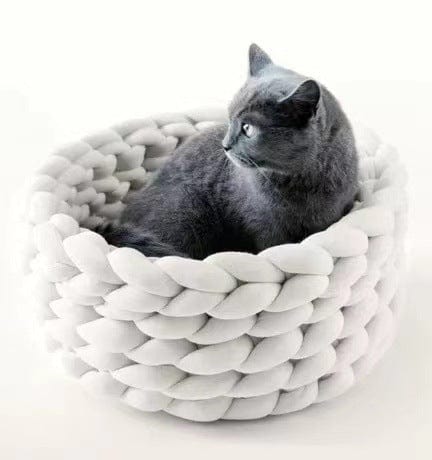 Handwoven cat bed in natural beige with a plush cushion and breathable design, perfect for small pets to relax and feel cozy. 4