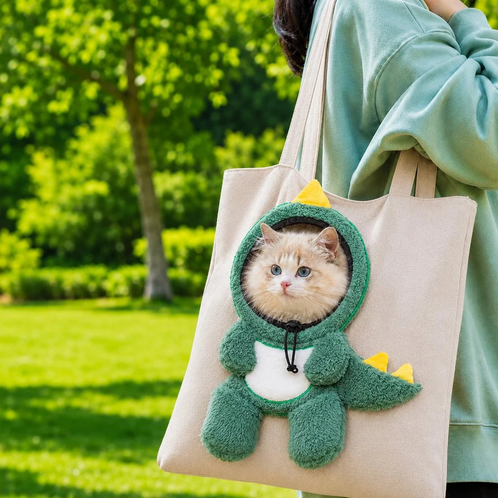 Lightweight canvas cat carrier tote designed for small dogs and cats, featuring adjustable safety straps for secure travel. 22