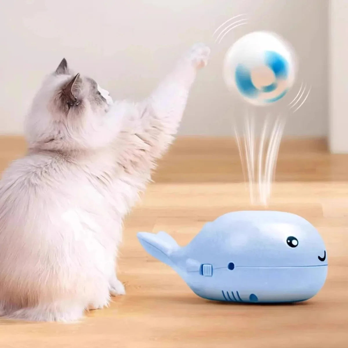 Interactive Whale-Shaped Electric Gliding Ball Toy for Cats – USB Rechargeable with Fan Function 1