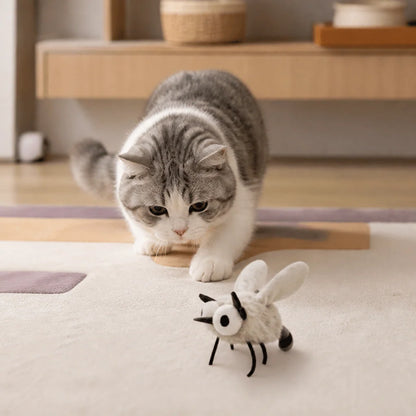 Motion-activated cat toy featuring a realistic flying insect design, made with soft pet-friendly fabric for interactive play. 0