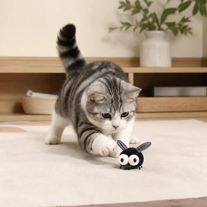 Motion-activated cat toy featuring a realistic flying insect design, made with soft pet-friendly fabric for interactive play. 7