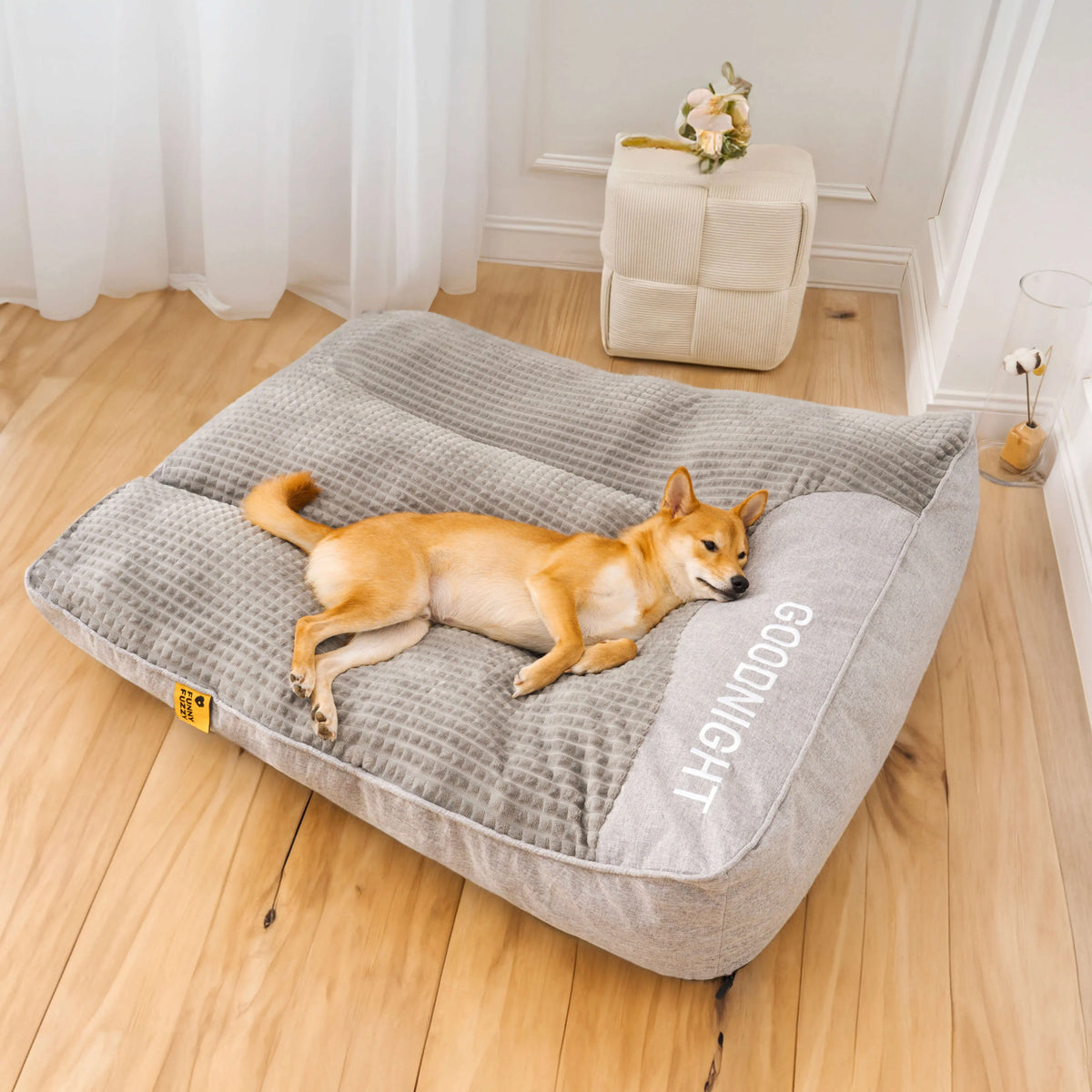 Orthopedic dog bed with elevated bolster edge, featuring a soft velour removable cover, designed for large dogs to provide ultimate comfort and support. 7