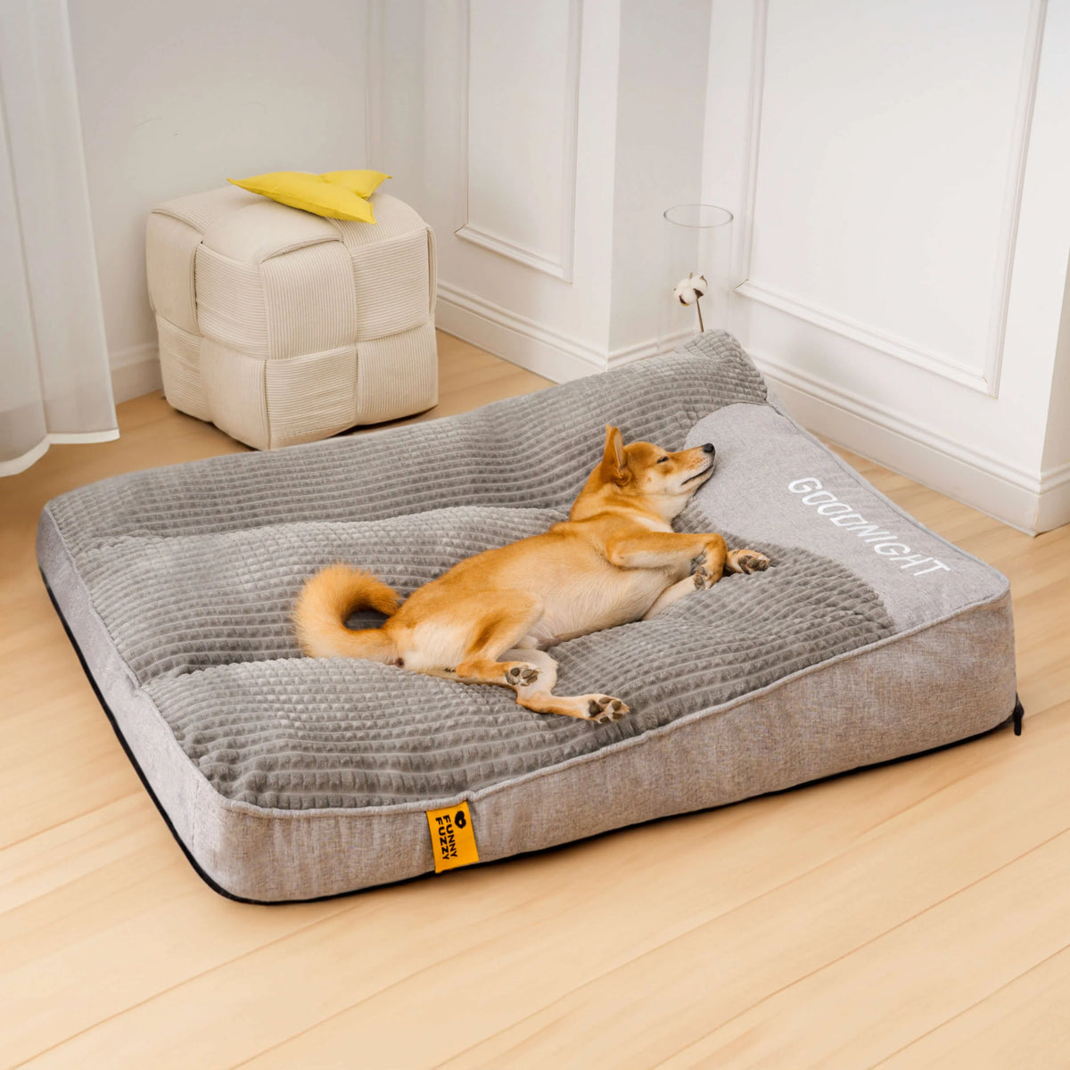 Orthopedic dog bed with elevated bolster edge, featuring a soft velour removable cover, designed for large dogs to provide ultimate comfort and support. 8