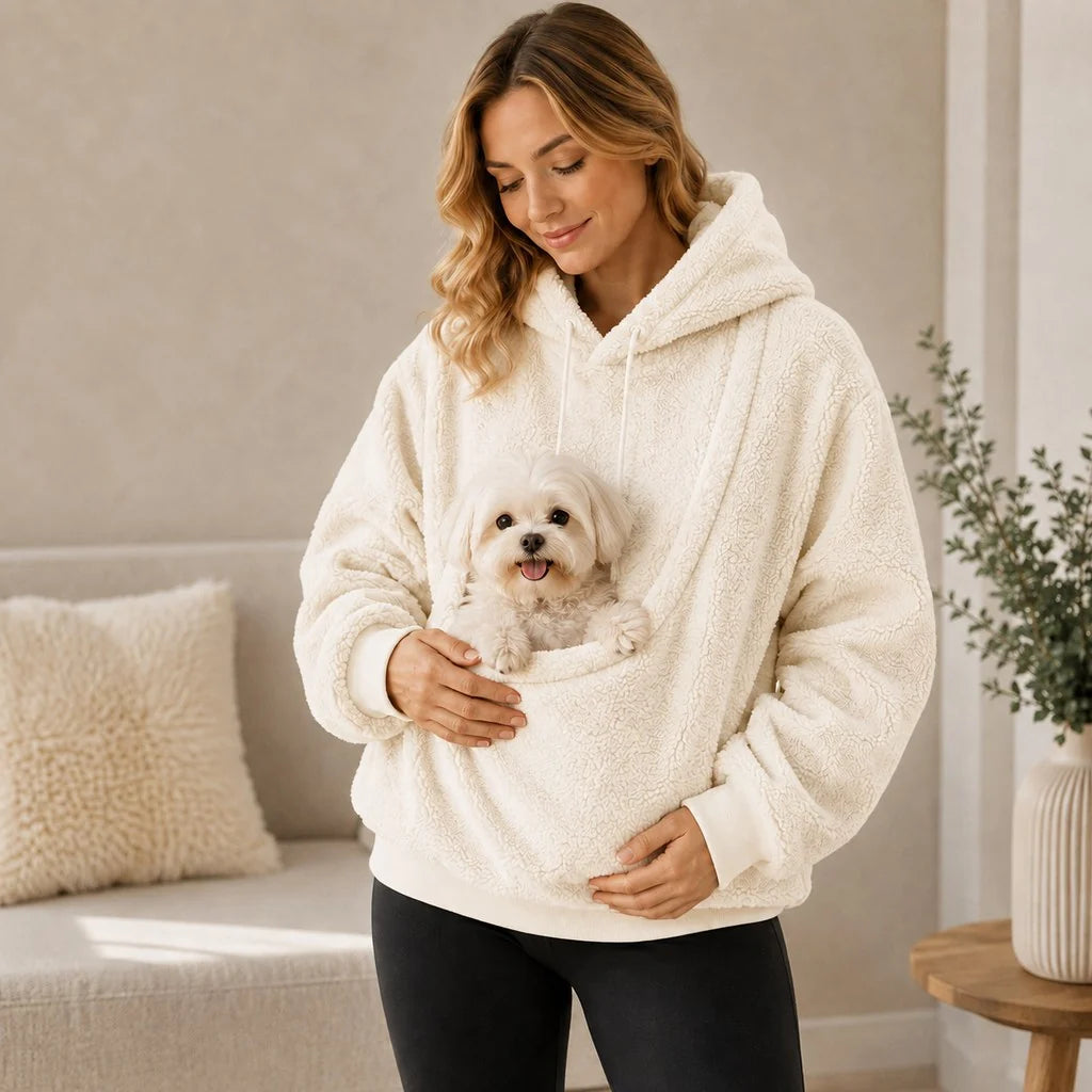 Cozy pet carrier hoodie featuring an integrated pouch and soft Sherpa fleece, perfect for small dogs and cats. 10