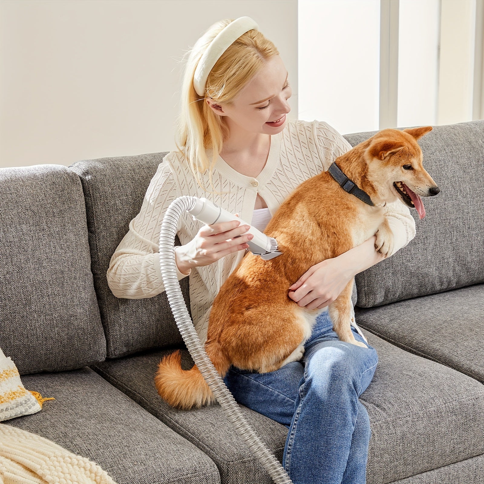 5-in-1 pet grooming kit featuring a vacuum and clippers, designed for easy and efficient grooming of dogs and cats, showcasing a sleek design and 7