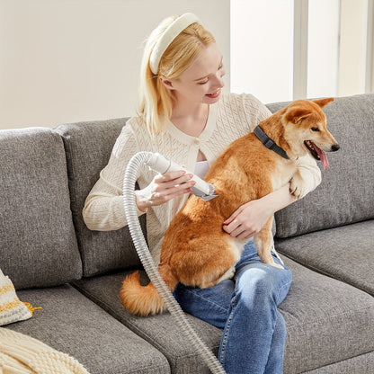 5-in-1 pet grooming kit featuring a vacuum and clippers, designed for easy and efficient grooming of dogs and cats, showcasing a sleek design and 7