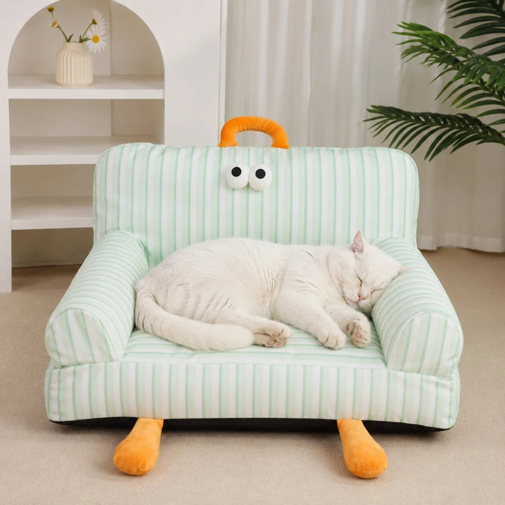 Cozy pet sofa bed for cats and small dogs featuring plush fabric and raised armrests, perfect for indoor lounging. 0
