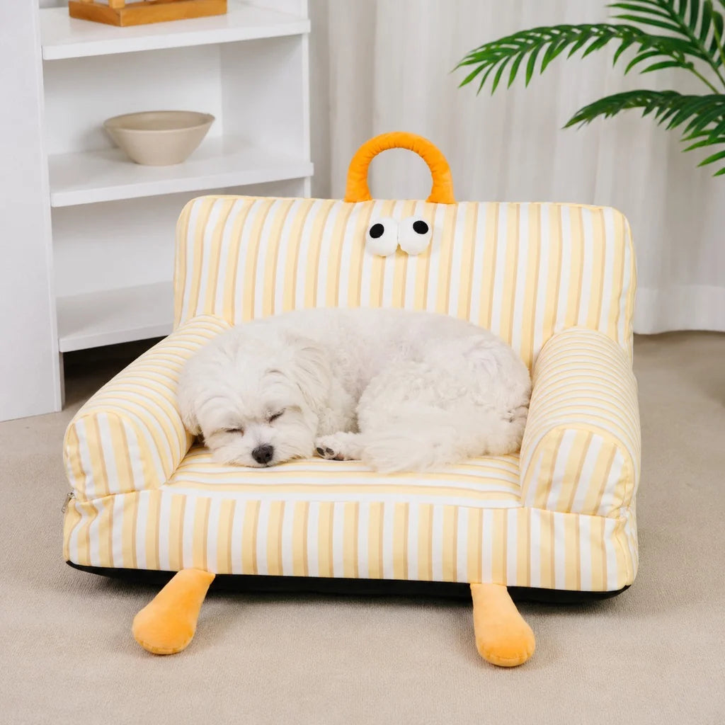 Cozy pet sofa bed for cats and small dogs featuring plush fabric and raised armrests, perfect for indoor lounging. 11