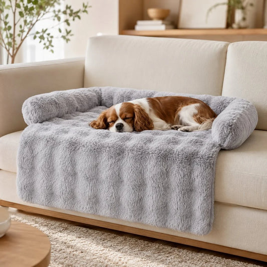 Plush pet bed featuring a 3-sided bolster for added comfort and non-slip backing, designed as a cozy sofa protector for dogs and cats. 0