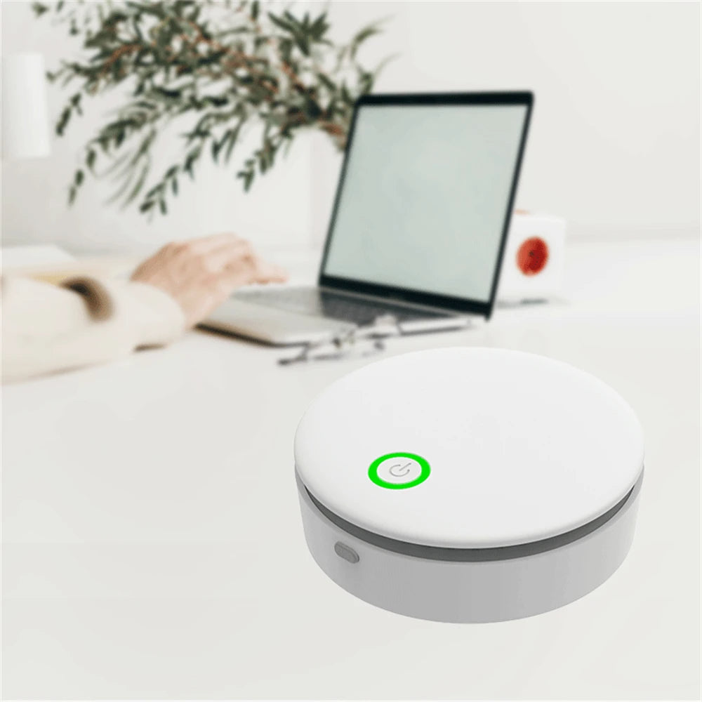 Portable air purifier for home use in white ABS, designed for odor elimination and pet-safe functionality, featuring a durable construction ideal for improving indoor air quality. 0