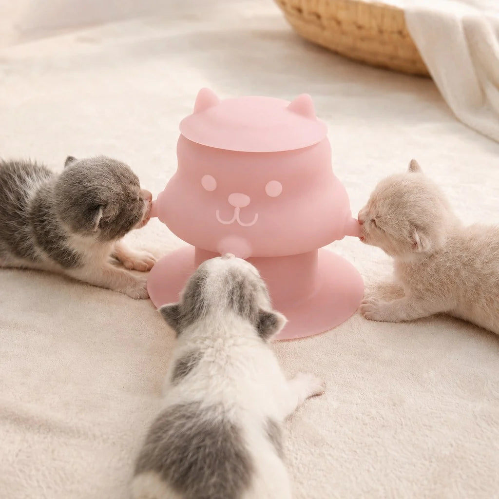 Silicone pet nursing feeder with suction base for kittens and puppies, featuring a 4-nipple design that is flexible and easy to clean. 11