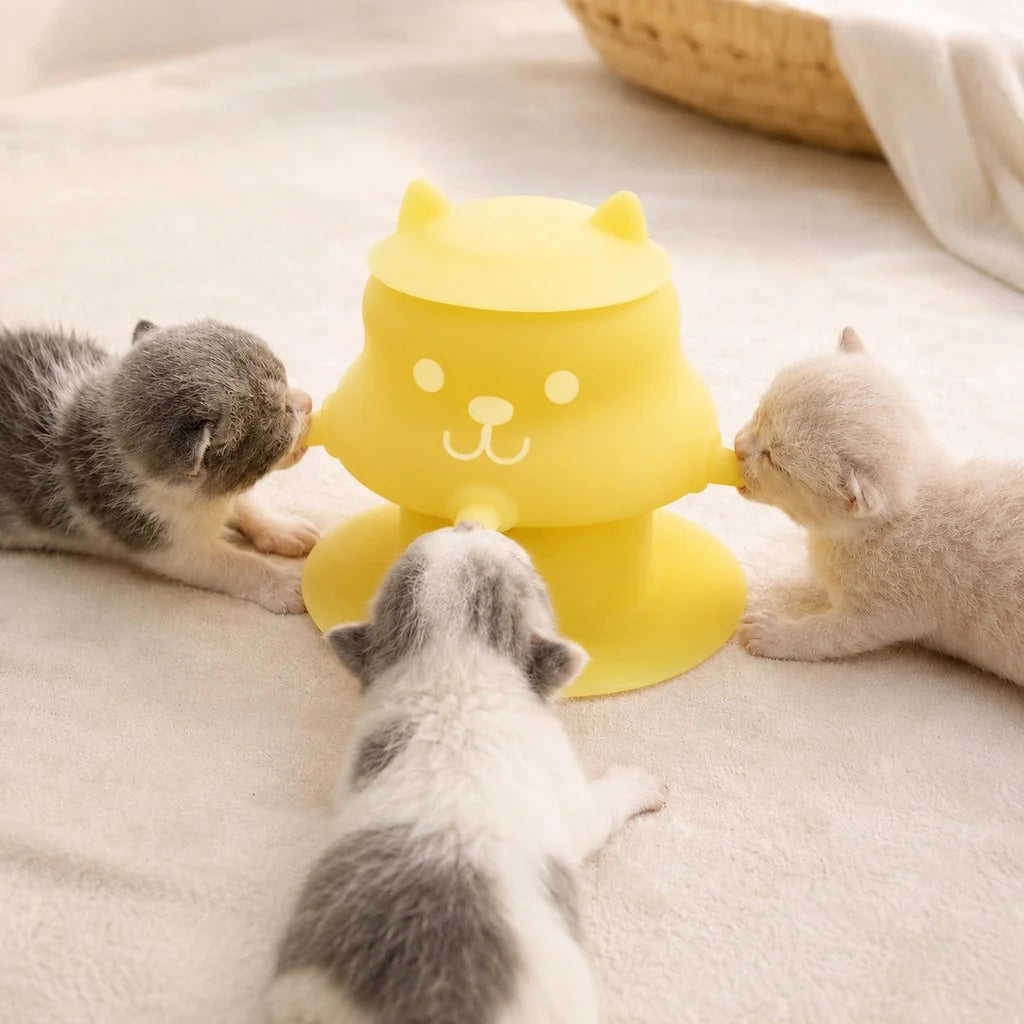 Silicone pet nursing feeder with suction base for kittens and puppies, featuring a 4-nipple design that is flexible and easy to clean. 9