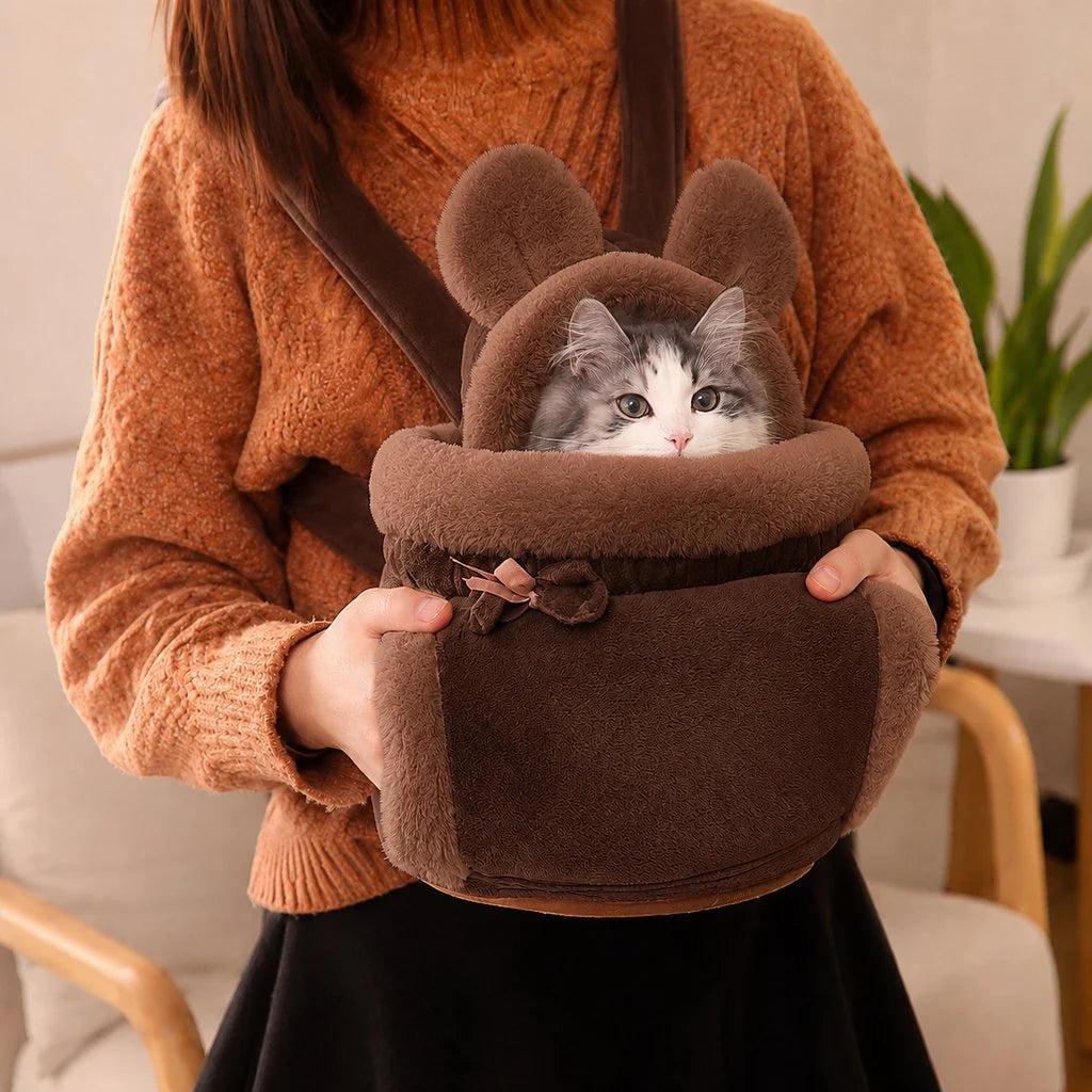 Soft Cat Carrier Backpack featuring a plush interior and adorable bunny-ear hood, designed for cozy travel with a winter-themed pattern, perfect for pet comfort and style 0