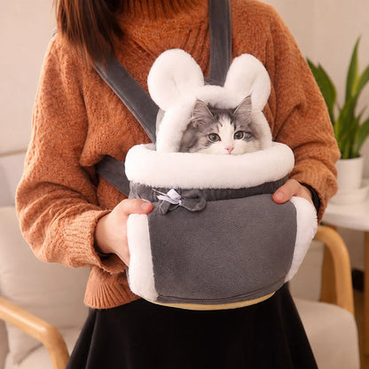 Soft Cat Carrier Backpack featuring a plush interior and adorable bunny-ear hood, designed for cozy travel with a winter-themed pattern, perfect for pet comfort and style 1