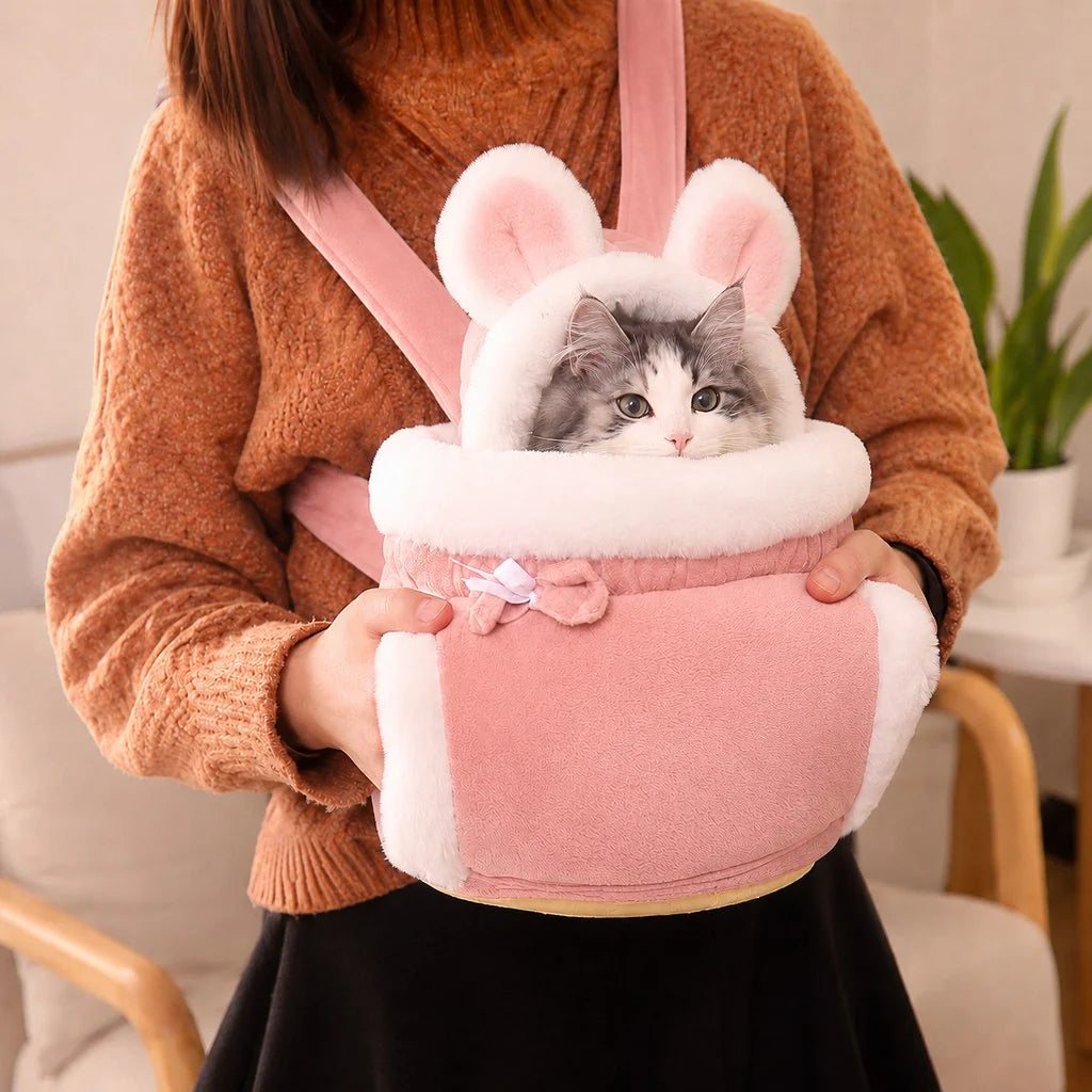 Soft Cat Carrier Backpack featuring a plush interior and adorable bunny-ear hood, designed for cozy travel with a winter-themed pattern, perfect for pet comfort and style 8