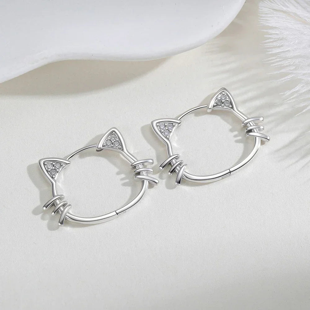 Sterling silver cat-ear hoop earrings featuring a hinged snap closure, crafted from hypoallergenic 925 silver for comfortable wear. 1