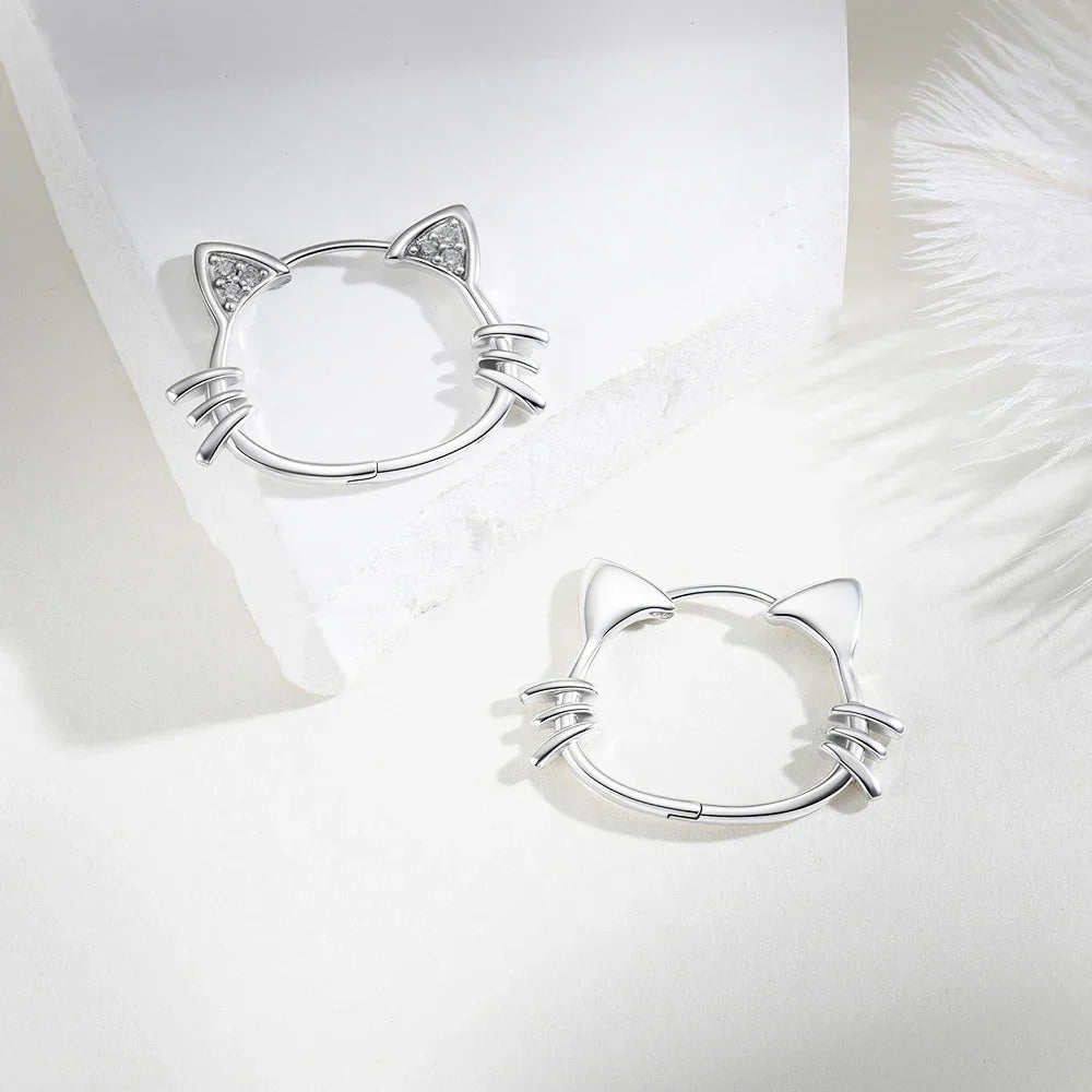 Sterling silver cat-ear hoop earrings featuring a hinged snap closure, crafted from hypoallergenic 925 silver for comfortable wear. 2