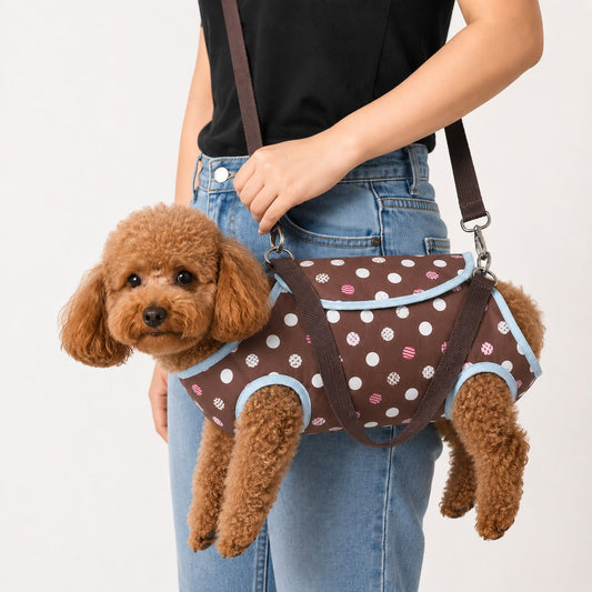 Wearable pet carrier harness for small dogs and cats featuring breathable mesh fabric, hands-free design, and available in playful polka dot patterns. 0